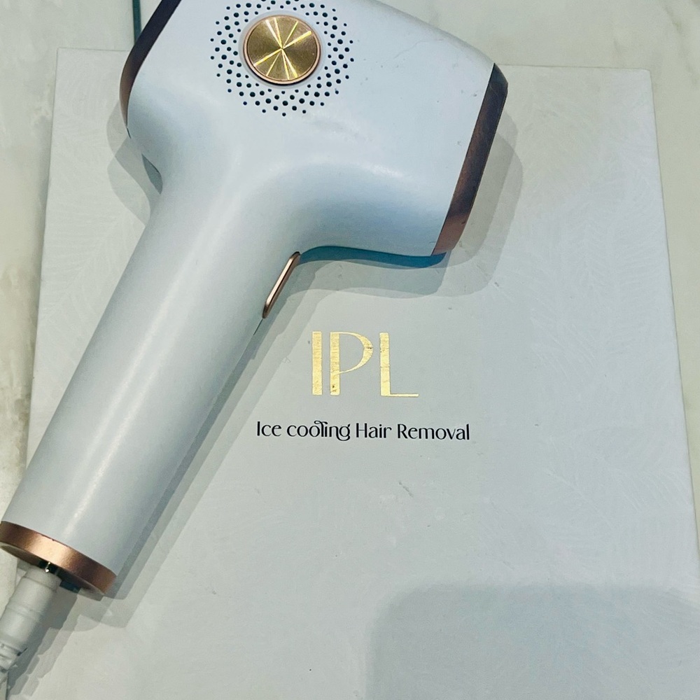 White and Gold IPL Hair Removal Device